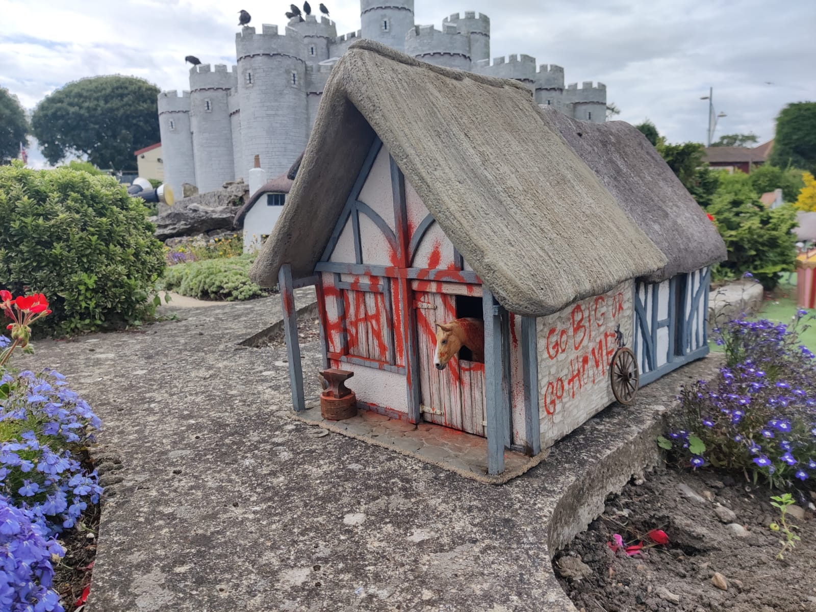 A Banksy artwork left at a model village in Norfolk is to go up for sale at North East Auction House