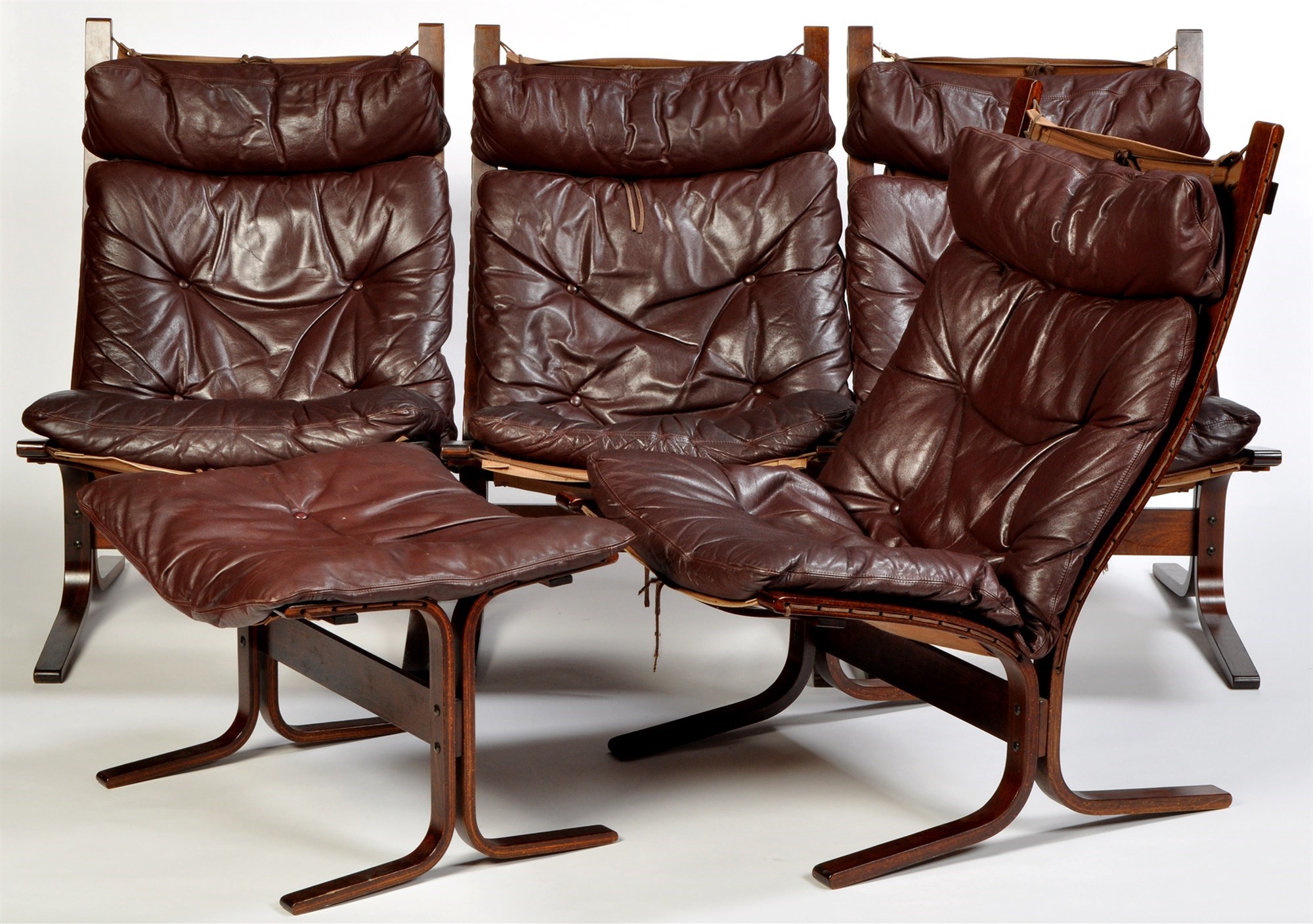 Westnofa designed by Ingmar Relling: four 'Siesta' chairs and a footstool,