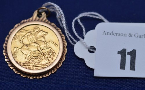 Lot 11 - An Edward VII gold sovereign, 1910, in yellow...