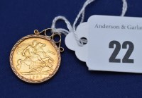 Lot 22 - A Victorian gold half sovereign, 1901, in 9ct....