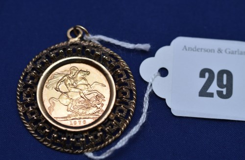 Lot 29 - An Elizabeth II gold sovereign, 1976, in 9ct....