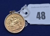 Lot 48 - A George V gold sovereign, 1911, in 9ct....