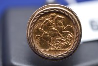 Lot 63 - A Victorian gold sovereign, 1889, in 9ct....