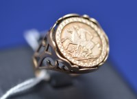 Lot 71 - A yellow metal and 9ct. yellow gold ring, the...