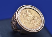 Lot 80 - A Victorian gold sovereign, 1901, in 9ct....