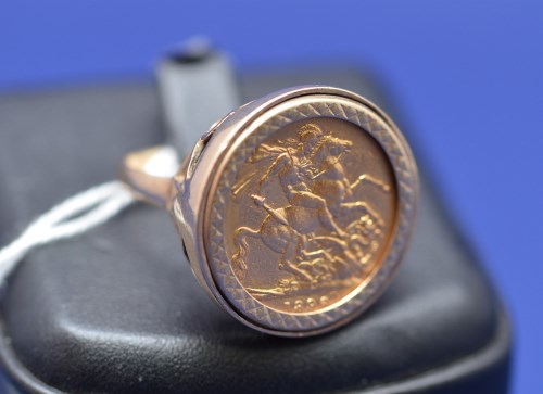 Lot 87 - A Victorian gold sovereign, 1896, in 9ct....