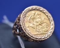 Lot 101 - An Edward VII gold sovereign, 1910, in 9ct....