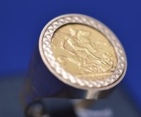 Lot 103 - A Victorian gold half sovereign, 1897, in 9ct....