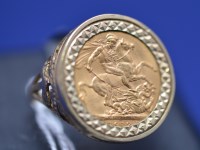 Lot 117 - A George V gold sovereign, 1912, in 9ct....