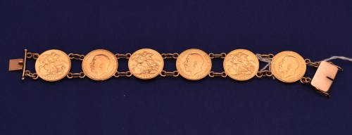 Lot 126 - A bracelet made up of six George V gold...