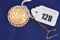 Lot 128 - A George V gold sovereign, 1911, in 9ct....
