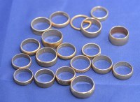 Lot 198 - A quantity of 9ct. yellow gold wedding bands,...