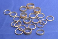 Lot 204 - A quantity of 9ct. gold wedding bands, some...