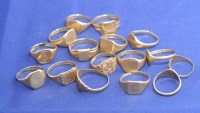 Lot 205 - A quantity of 9ct. signet rings, mainly...