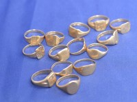 Lot 208 - A quantity of 9ct. yellow gold signet rings,...