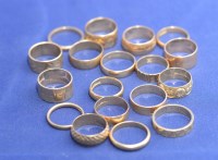 Lot 211 - A quantity of 9ct. yellow gold wedding bands,...