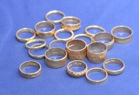 Lot 212 - A quantity of 9ct. yellow gold wedding bands,...