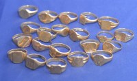 Lot 216 - A quantity of 9ct. yellow gold signet rings,...