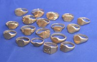 Lot 217 - A quantity of 9ct. yellow gold signet rings,...
