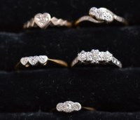 Lot 221 - Five diamond rings, four three-stone and one...
