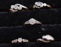 Lot 222 - Five diamond rings, three three-stone and two...