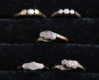 Lot 225 - Five three-stone diamond rings, all in...