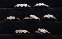 Lot 226 - Seven three-stone diamond rings, all in...