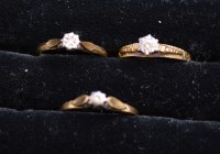 Lot 230 - Three single stone diamond rings, in illusion...