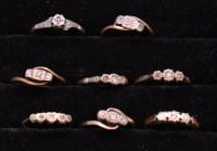 Lot 240 - Eight diamond rings, in illusion mounts on 9ct....