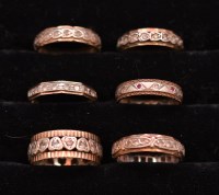 Lot 243 - Six white stone-set eternity rings, one also...