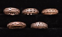 Lot 247 - Five white stone set eternity rings, various...