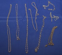Lot 254 - Yellow metal chain necklaces (some broken),...
