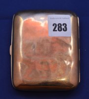 Lot 283 - A 9ct. yellow gold cigarette case by Smith &...