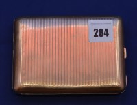 Lot 284 - A 9ct. yellow gold cigarette case, by Clark &...
