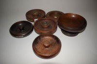 Lot 148 - Five ashtrays and a bowl in wood reclaimed...