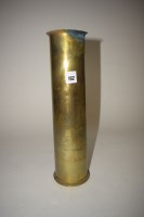 Lot 162 - Trench Art: a brass shell case engraved with...
