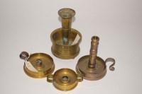 Lot 171 - Four brass candlesticks made from WWI shell...