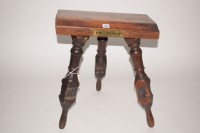 Lot 173 - A tripod stool made from timber taken from HMS...