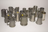 Lot 194 - A large quantity of pewter tankards with...