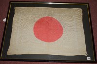 Lot 215 - A WWII Japanese flag, mounted and framed.