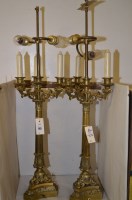 Lot 703 - A pair of early 20th Century cast brass...