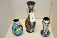 Lot 756 - Three modern Moorcroft vases with floral...