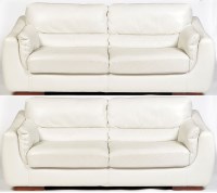 Lot 914 - A pair of modern white leather two-seater...