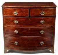 Lot 1003 - A George III mahogany bowfront chest of two...