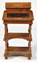 Lot 1045 - A Victorian rosewood davenport, decorated with...