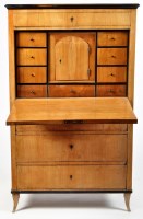 Lot 1047 - An early 19th Century German flame birch...