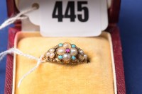 Lot 445 - A ruby, turquoise and seed pearl ring, c.1830,...