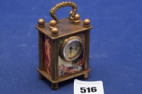 Lot 516 - An Omega Swiss miniature carriage clock,...