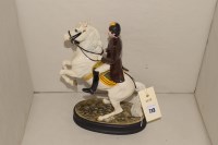 Lot 713 - A Beswick model of a Lipizzaner and rider.