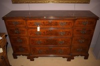 Lot 1163 - A walnut reproduction breakfront chest, four...